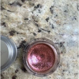 Two Trinny makeup items rebalance in Tanisha  and lip shimmer in Nicole